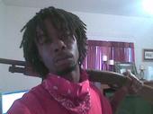 Red rag tied round a 45 in ckase niggaz ckome 4 me profile picture